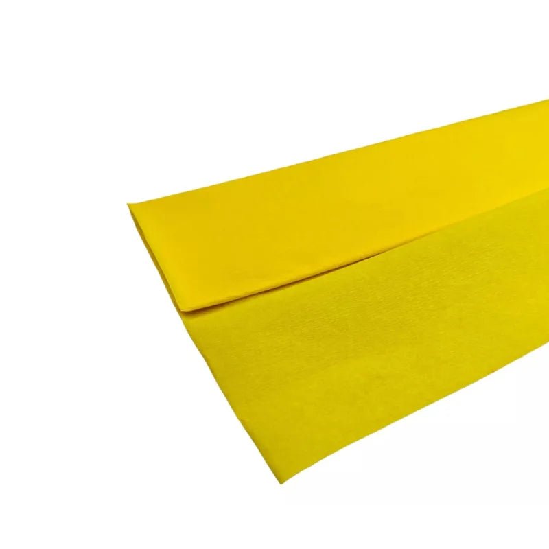 Papel crepé amarillo de 50x200 cm, ideal para decoraciones y manualidades. ¡Encuéntralo en Officemate!