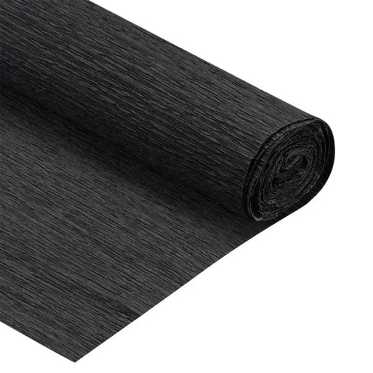 Rollo de papel crepé negro Artesco, resistente y elástico, ideal para manualidades y decoraciones. ¡Disponible en Officemate!