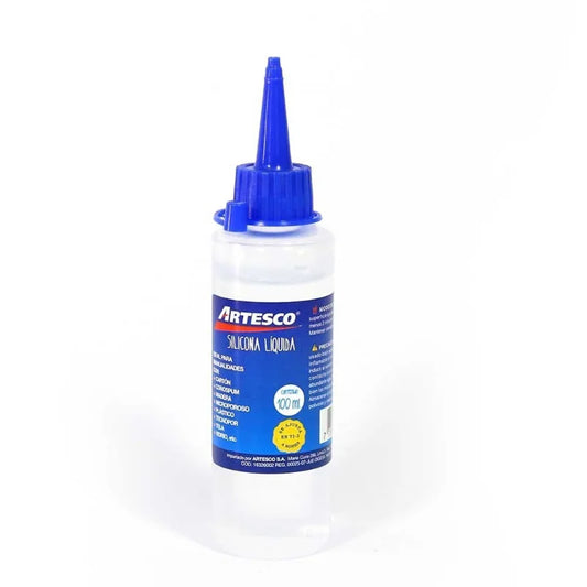 Silicón líquido Artesco de 100 ml, vista frontal del envase con boquilla aplicadora. Disponible en Officemate República Dominicana.